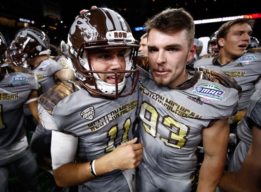 DETROIT, MI - DECEMBER 02: Zach Terrell #11 of the Western Michigan Broncos celebrates...