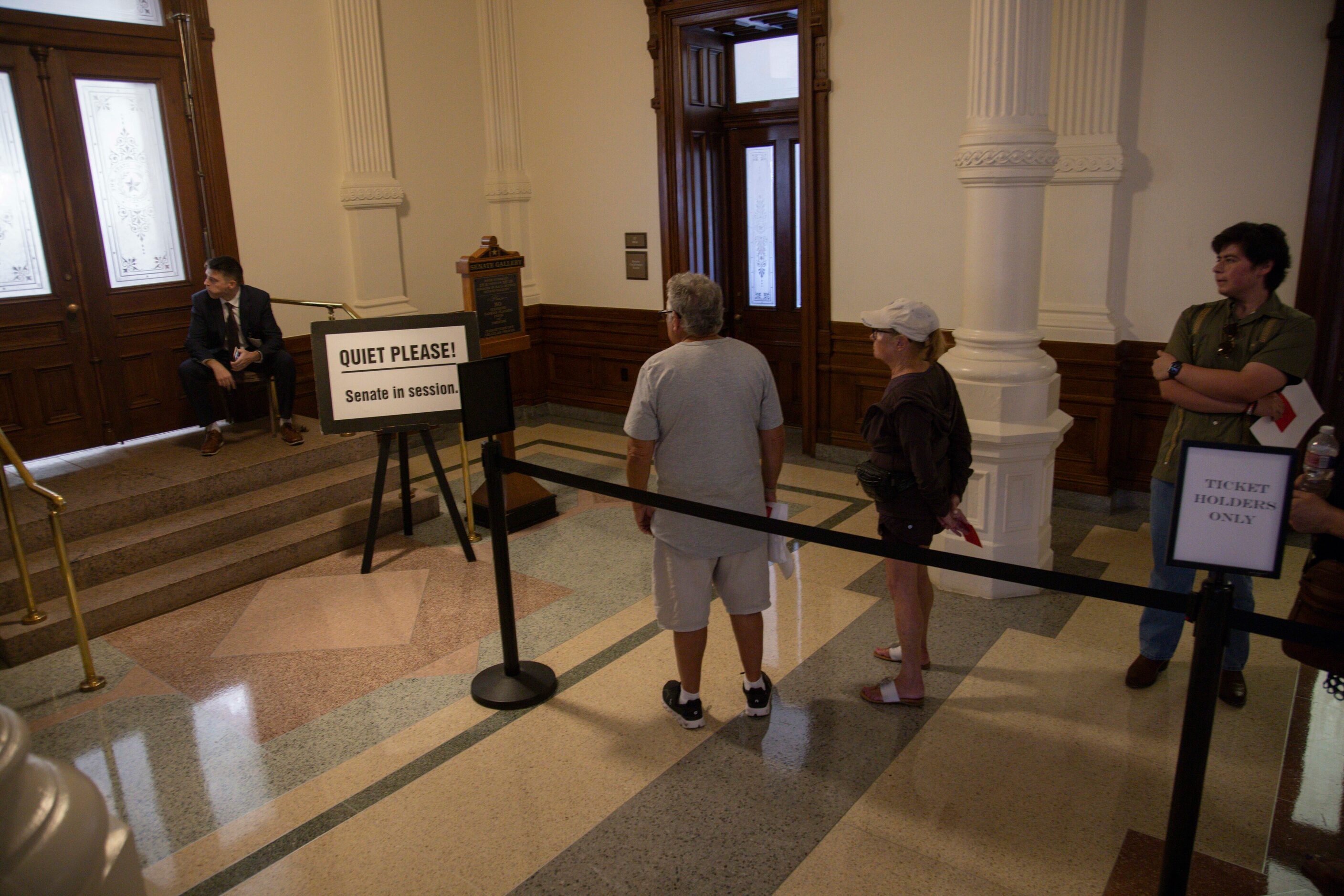 The public waits in line to enter the afternoon session during the fourth day of Texas...