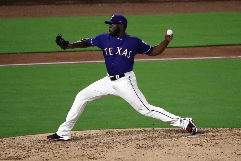ARLINGTON, TX - SEPTEMBER 05:  C.D. Pelham #64 of the Texas Rangers throws against the Los...