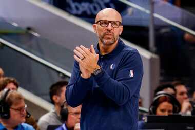 Dallas Mavericks head coach Jason Kidd watches the second half of Game 3 of an NBA...