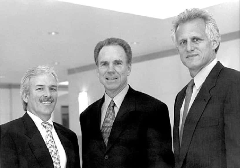 From left: Jim Leslie, Roger Staubach and Robert Shaw are shown in 2000 after announcing the...