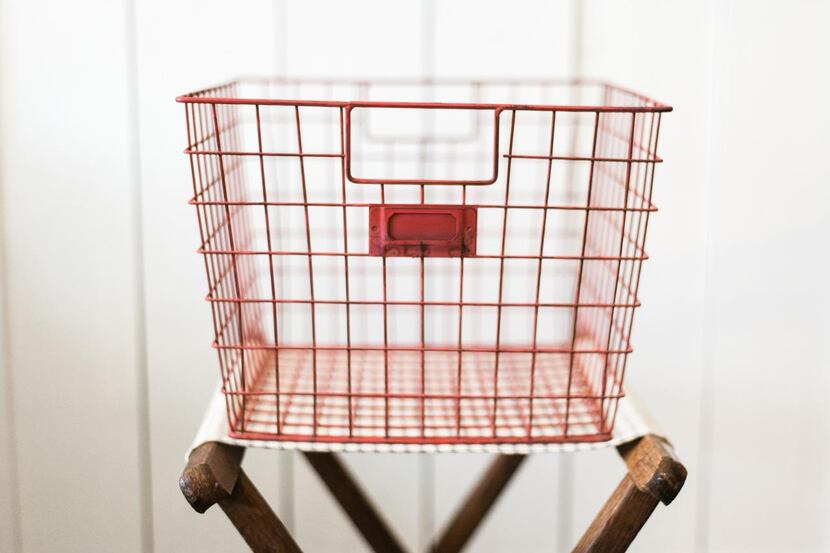 When looking  for accessories, think about function. The red locker basket from Magnolia...