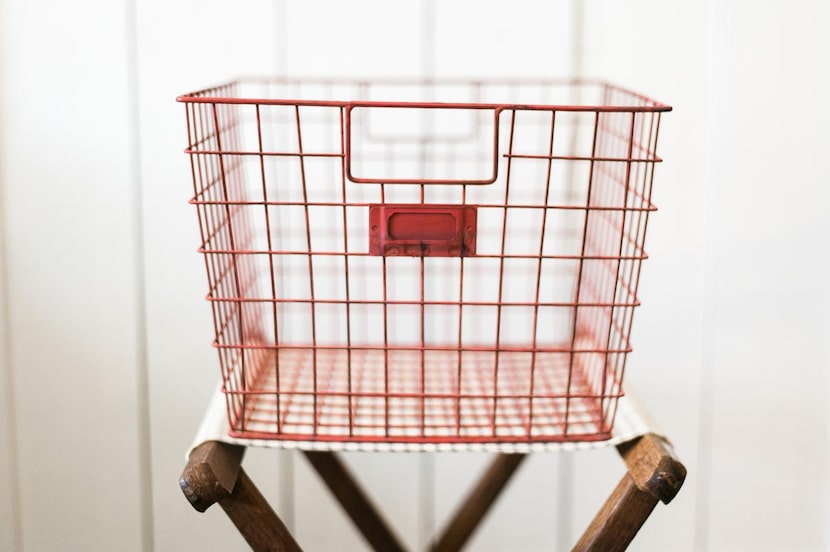 When looking  for accessories, think about function. The red locker basket from Magnolia...