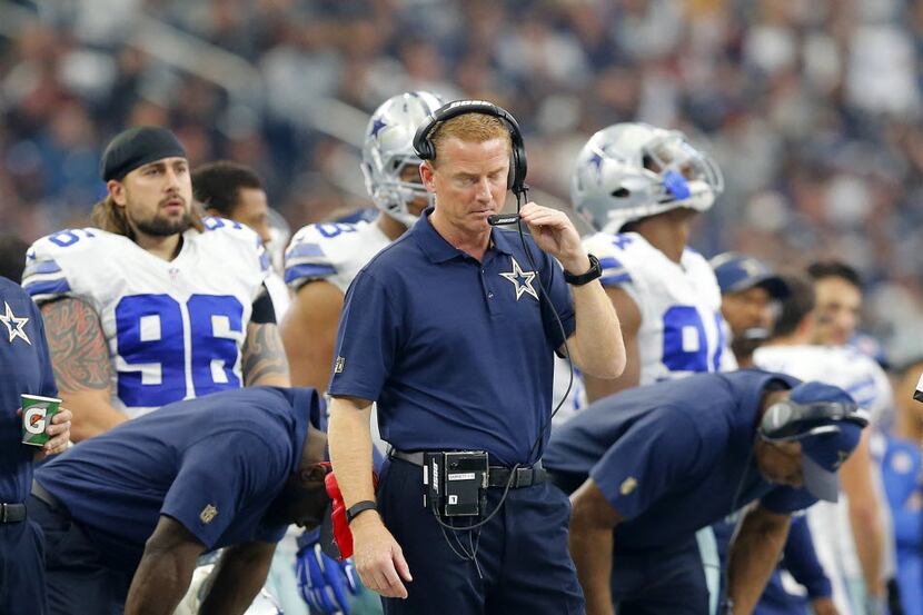 At times, the Dallas Cowboys staff, including head coach Jason Garrett (center), couldn't...