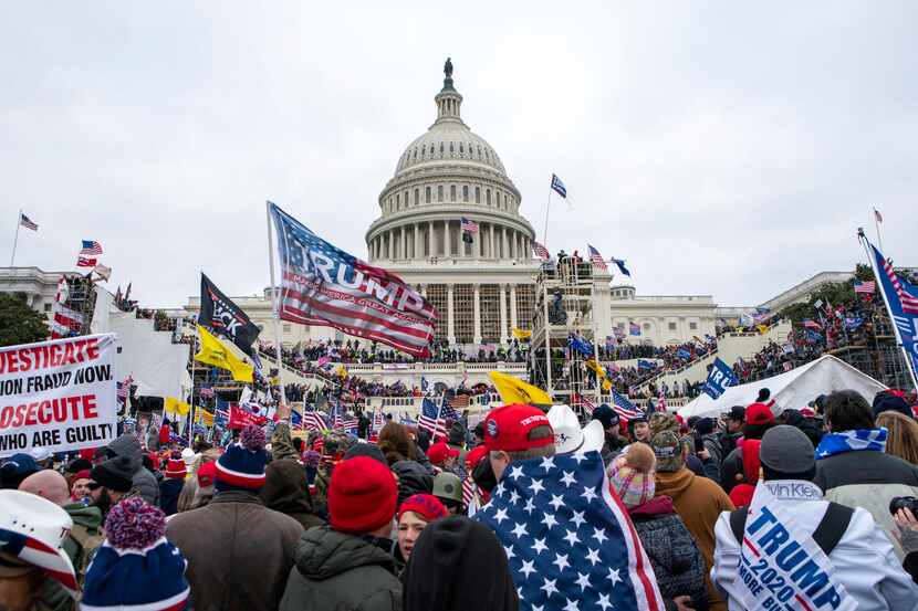 FILE - Rioters loyal to President Donald Trump rally at the U.S. Capitol in Washington on...