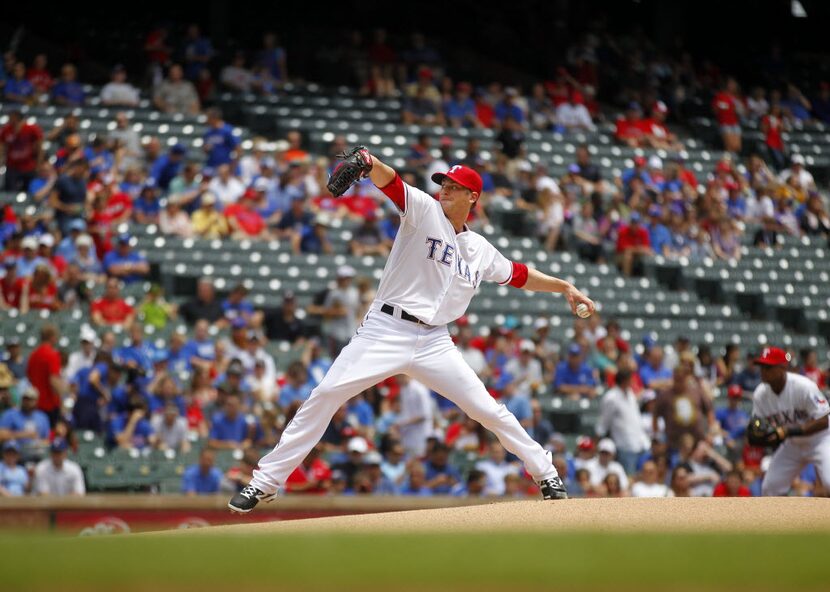 Texas Rangers starting pitcher Ross Detwiler (47) throws against the Kansas City Royals in...