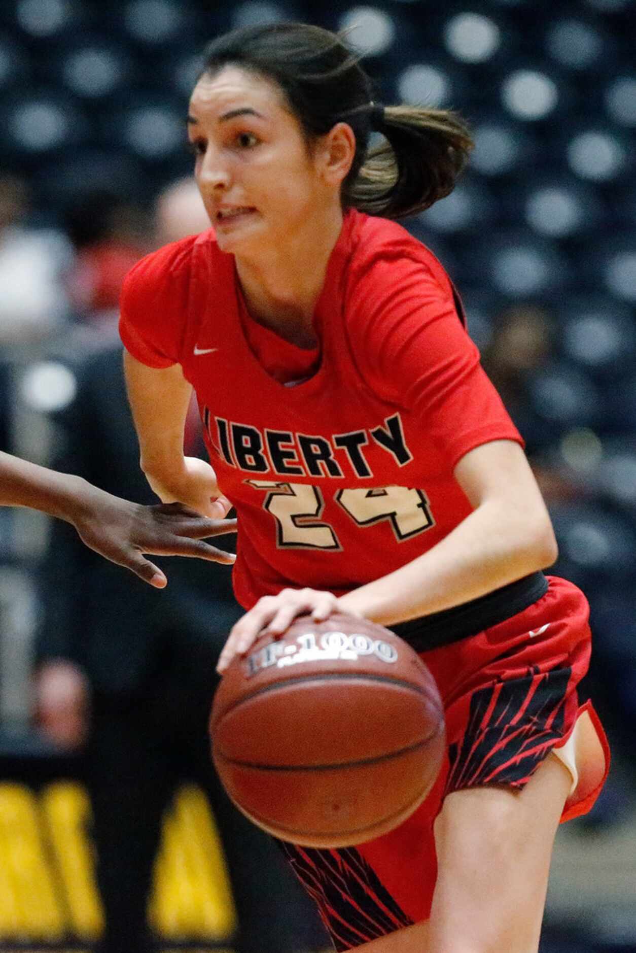 Frisco Liberty High School guard Maya Jain (24) breaks toward the basket during the first...