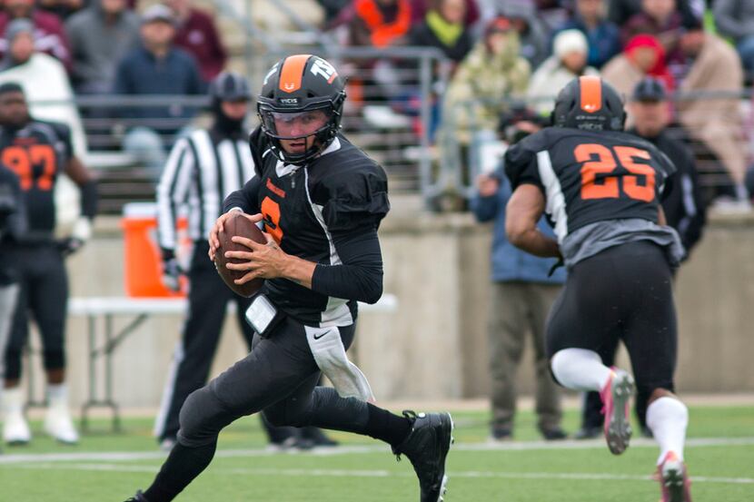 Former Texas A&M and Cleveland Browns QB Johnny Manziel (2) of the South team looks for an...