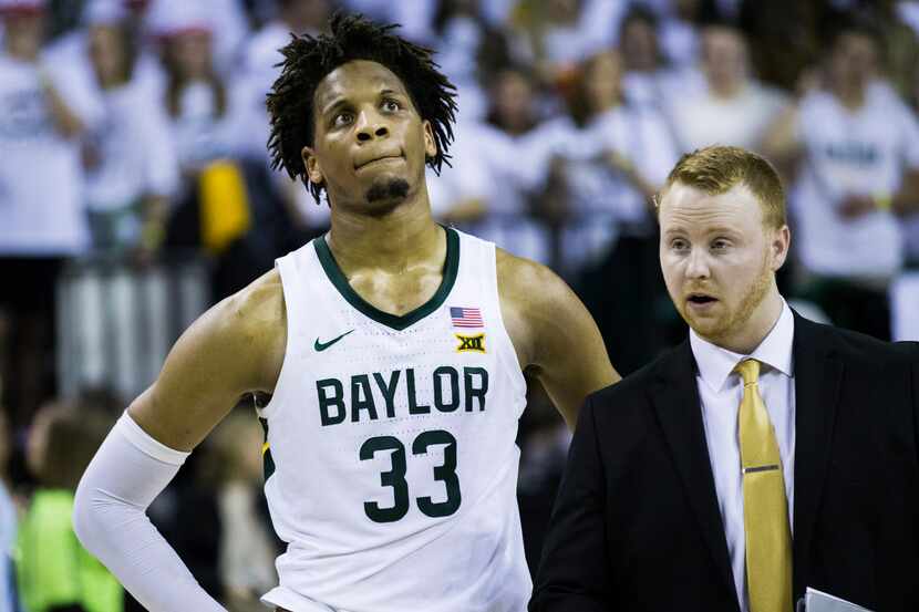 Baylor Bears forward Freddie Gillespie (33) reacts to a 64-61 loss to Kansas Jayhawks after...