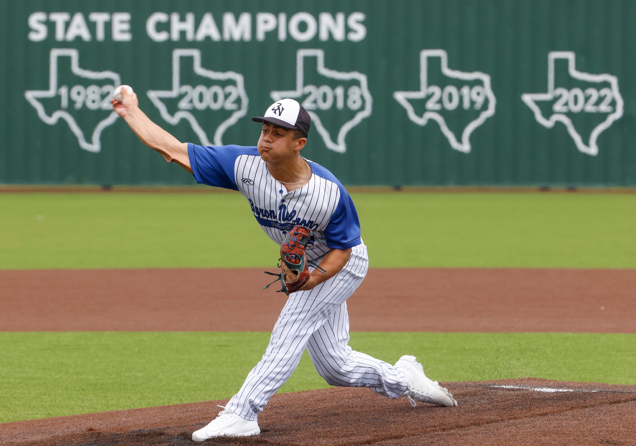 Byron Nelson High School’s Luis Santiago Castro throws a pitch during the first inning of a...