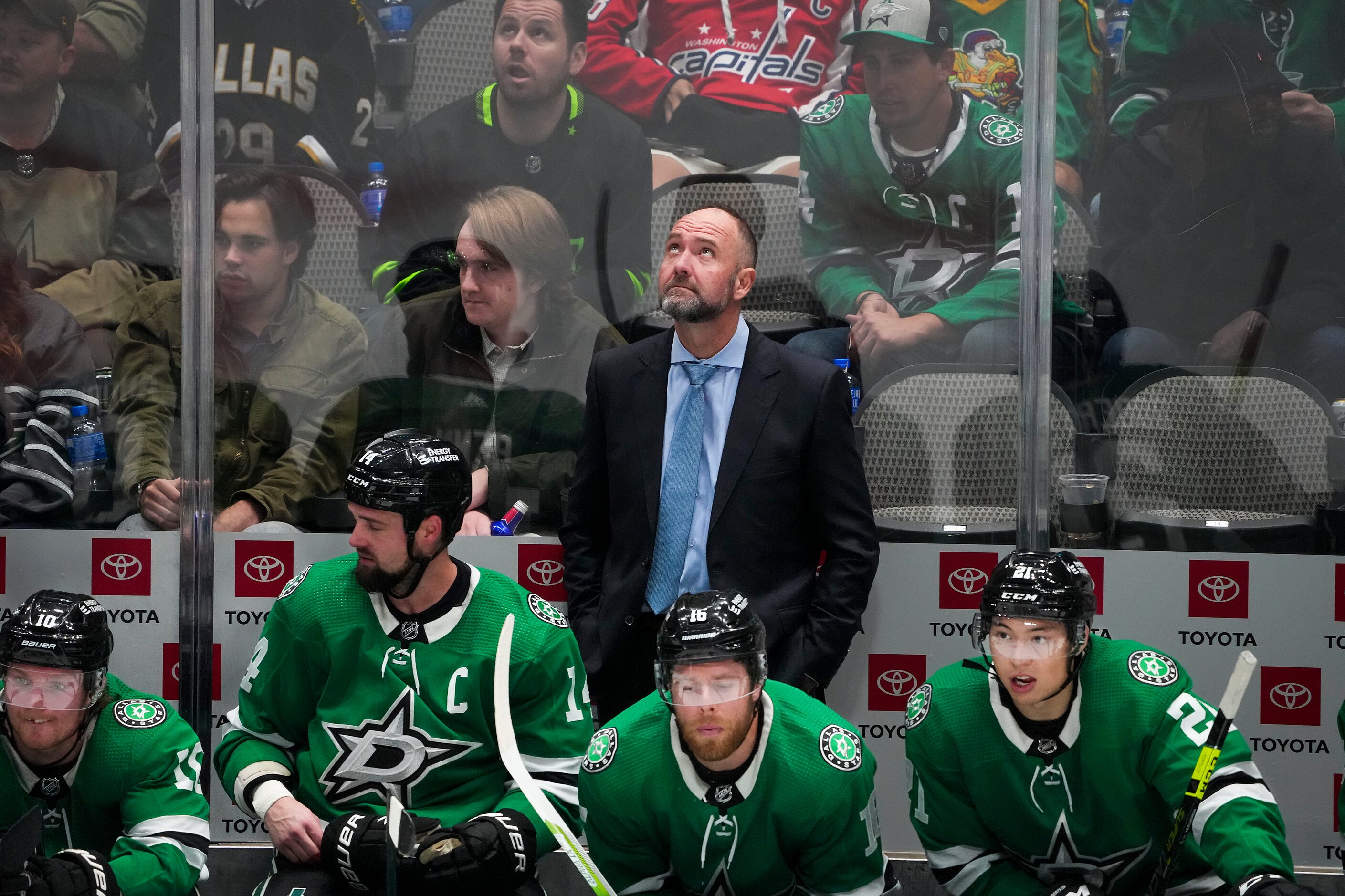 Dallas Stars coach Peter DeBoer looks on from te bench during the third period of an NHL...