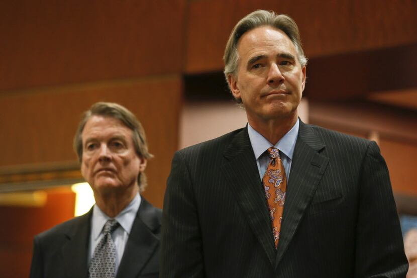 University of Texas athletic director Steve Patterson, right, and school president Bill...
