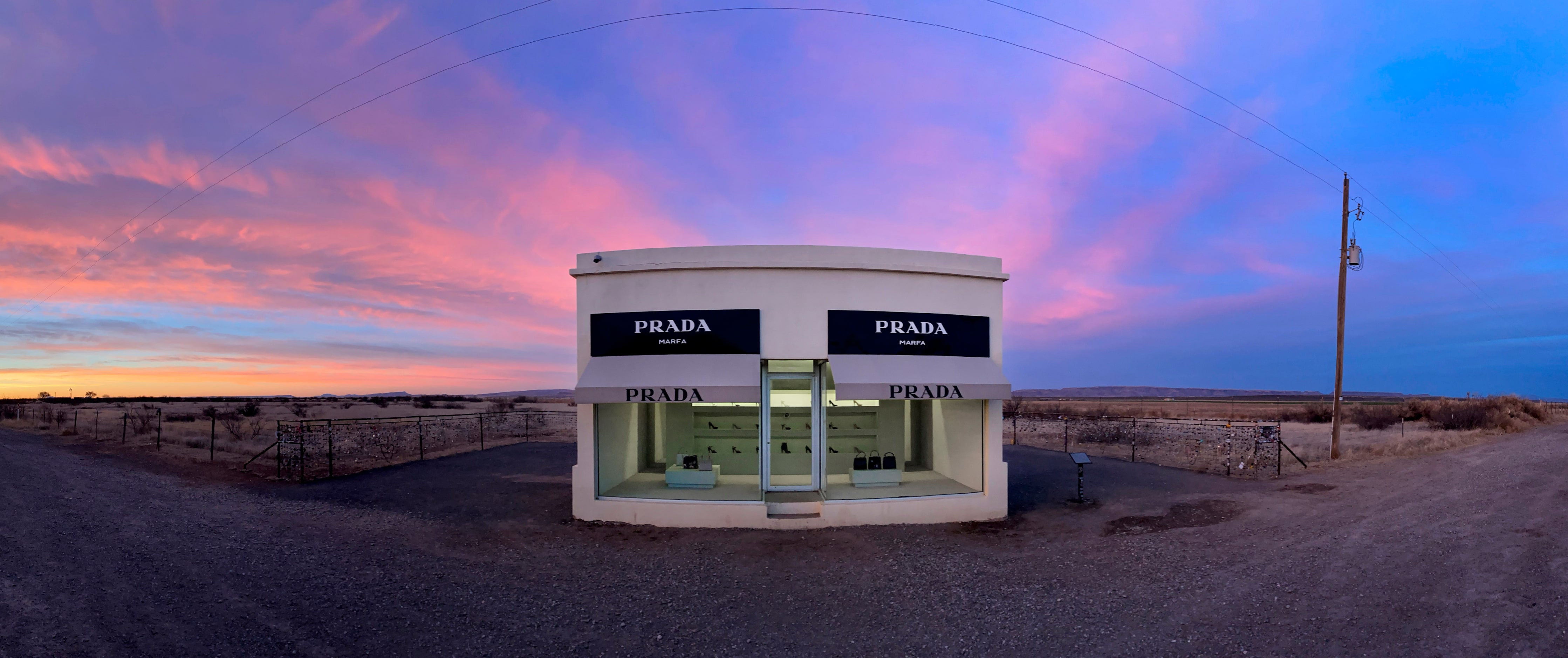 In this panoramic image, the skies turn pink and blue behind the permanent art installation...