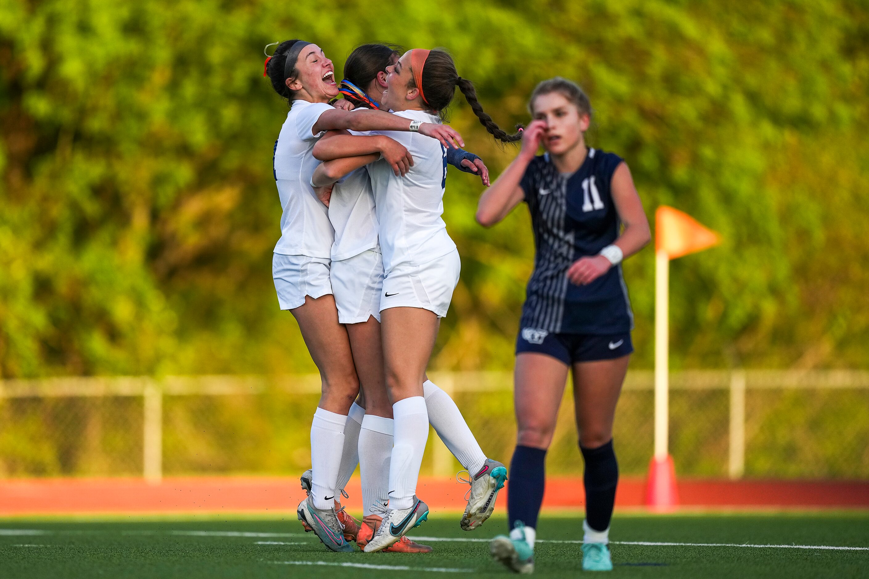 Frisco Wakeland’s Dilan Pistorius (center) celebrates with Finley McKnight (right) and...