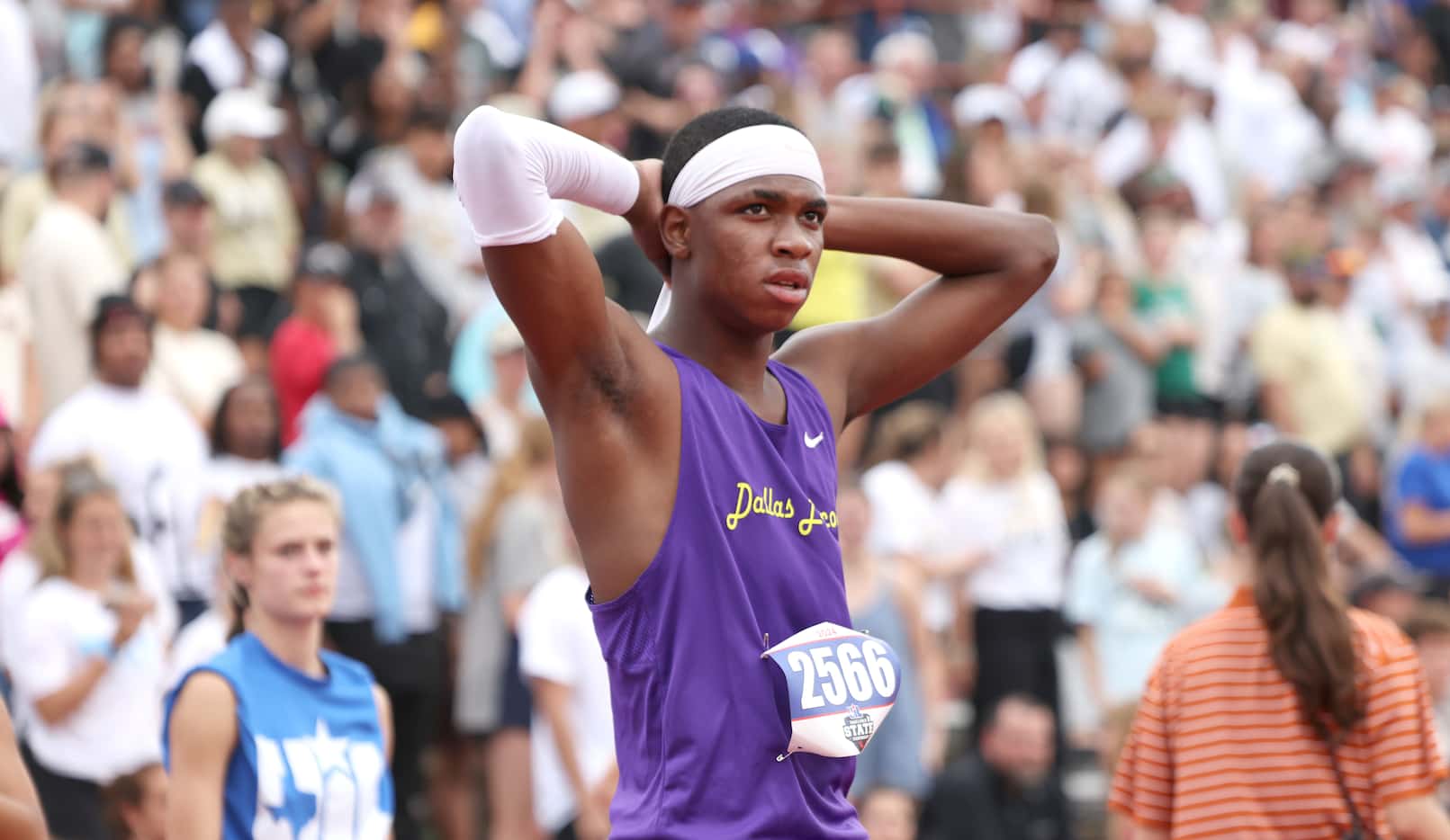 Dallas Lincoln's Roy Hughes awaits his finishing time following the Class 4A Boys 110 meters...