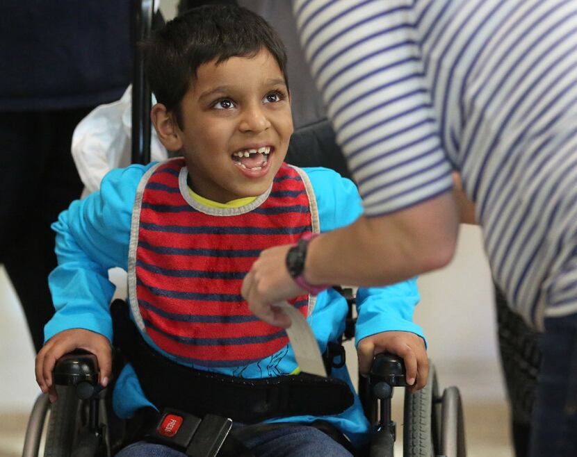 Adam Ahmed, 6,  gets set to drive a toy car at the Frisco ISD Career and Technical Education...
