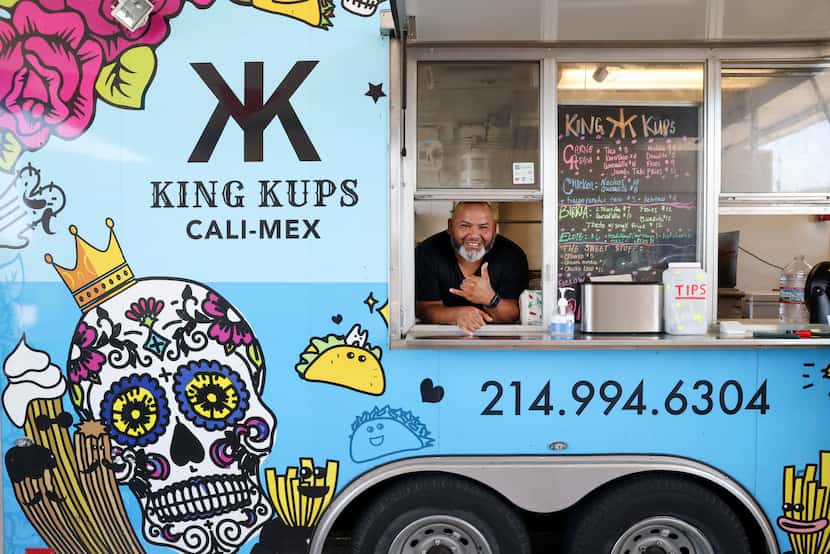 Owner Frank Hernandez leans out of the window of King Kups in McKinney on Wednesday, July...