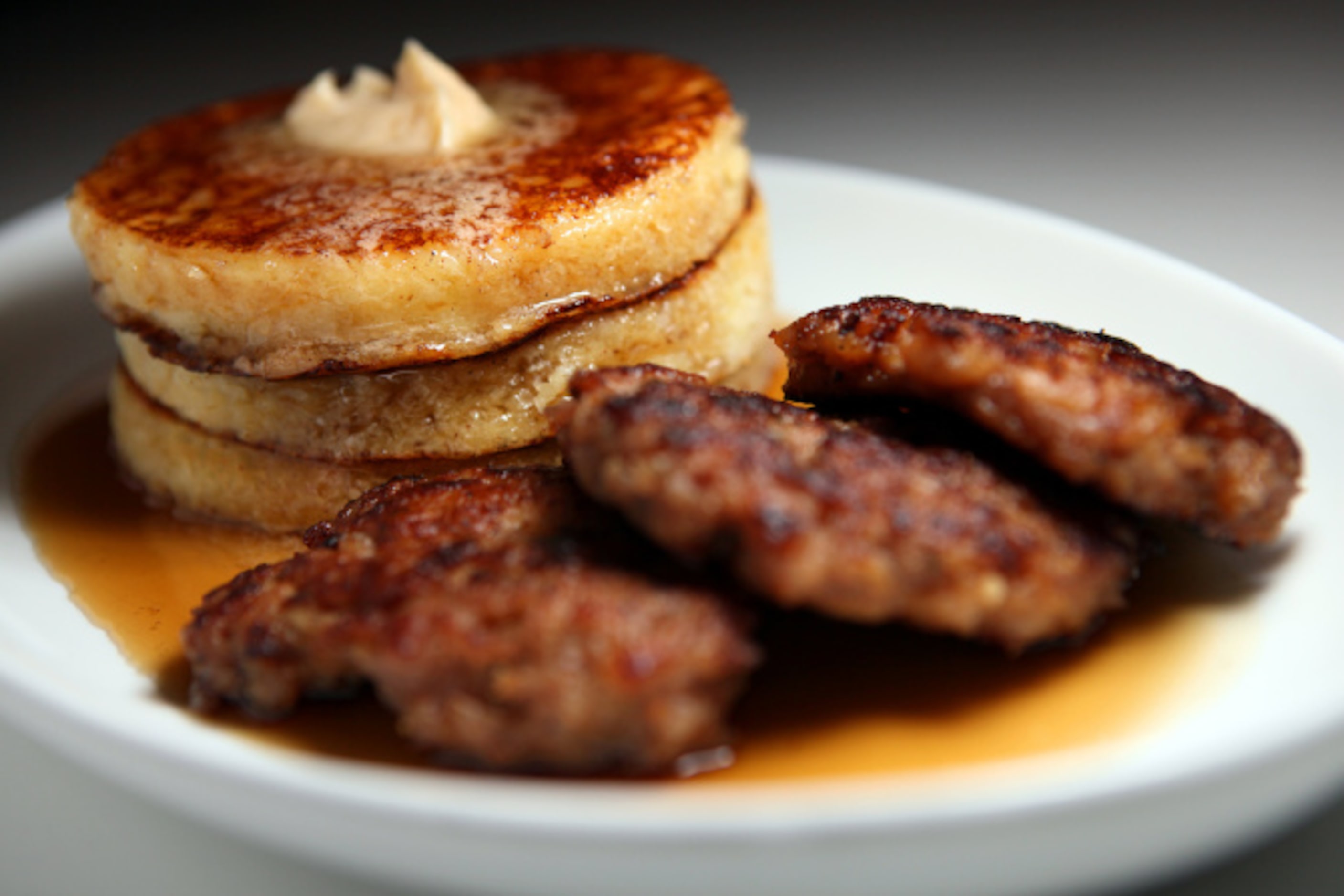 Buttermilk short stack with house sausage, cinnamon butter and maple, from The Front Room: A...