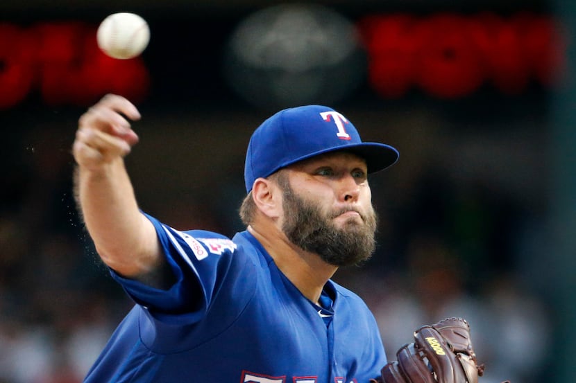 Texas Rangers starting pitcher Lance Lynn (35) throws against the Houston Astros during the...