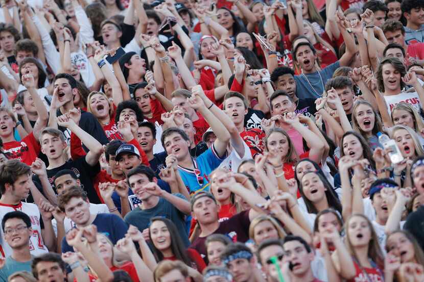 TXHSFB Flower Mound Marcus fans cheer on their team during the first half of a high school...