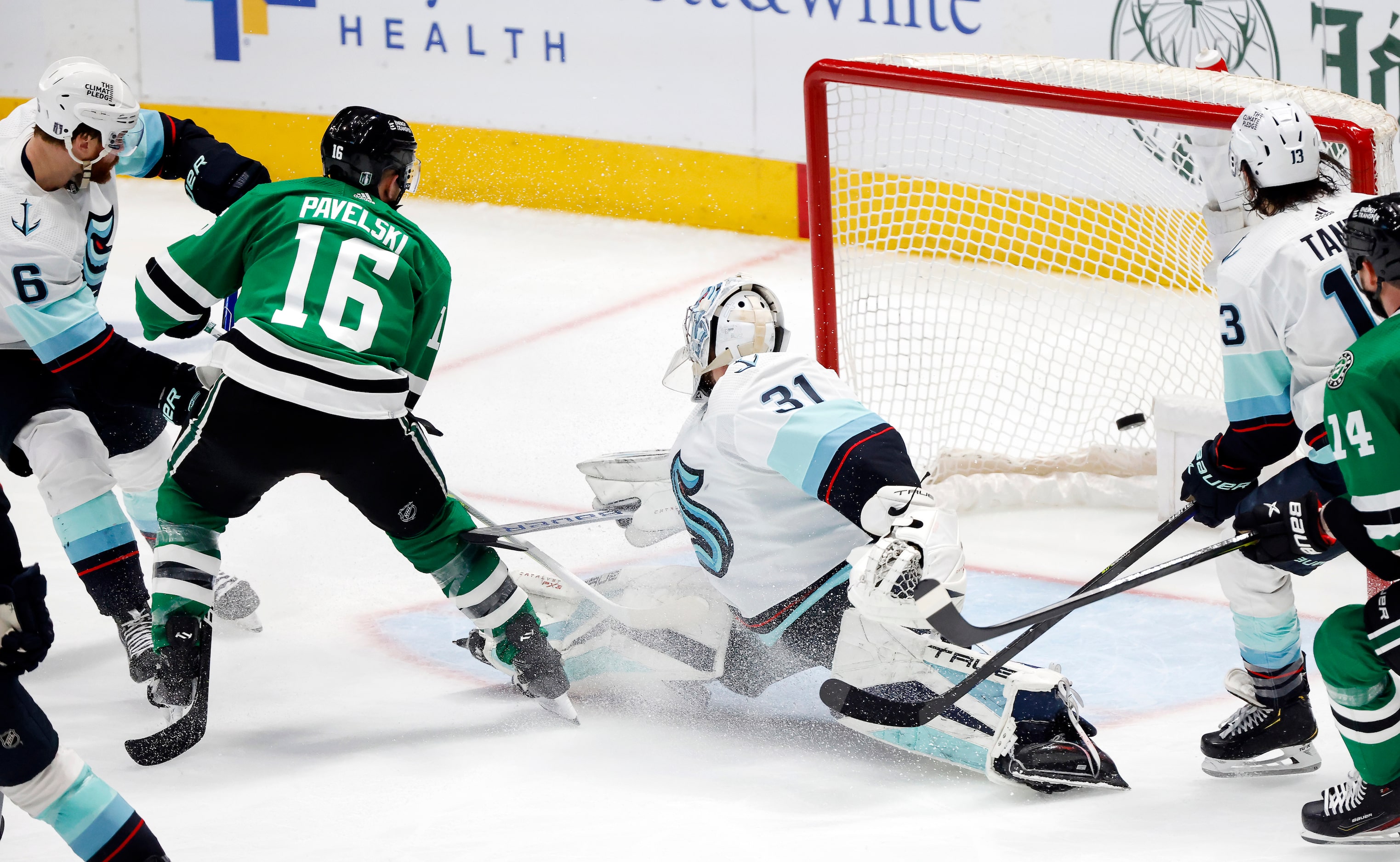 Dallas Stars center Joe Pavelski (16) scores the hat trick goal against Seattle Kraken...