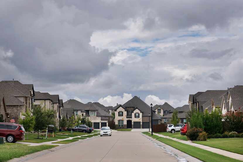 New homes line a street in the master-planned community of Timberbrook off of FM156 in Justin.