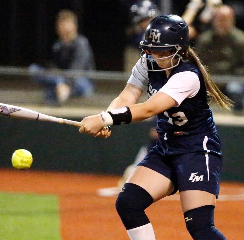 Flower Mound shortstop Kendall Jennings (13) gets a base hit in the fifth inning as Allen...