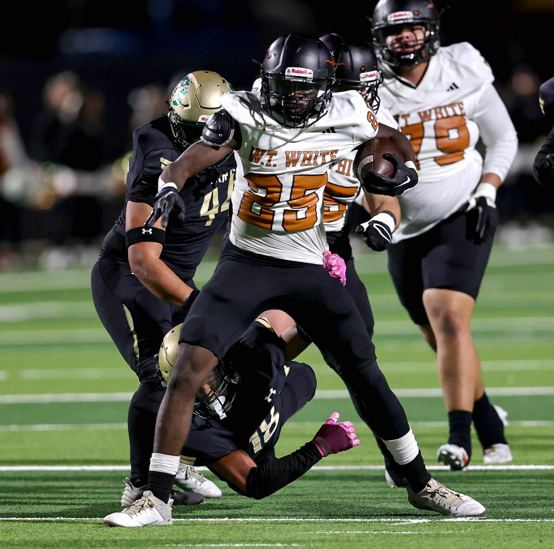 W.T. White running back Ben Ebeke (25) finds some running room against Birdville during the...