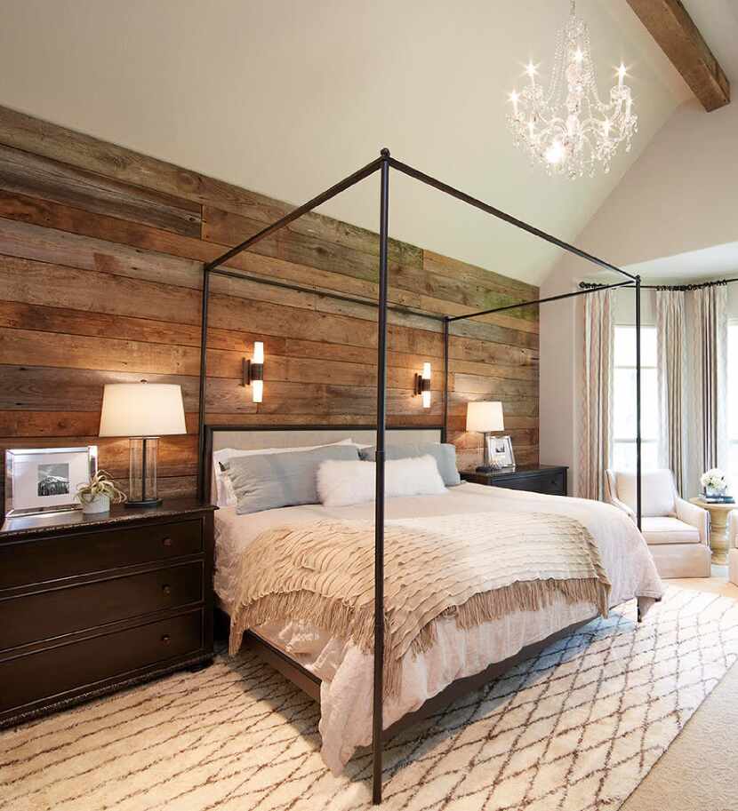 Emily Sheehan Hewett of A Well Dressed Home planked a master bedroom's walls with salvaged...