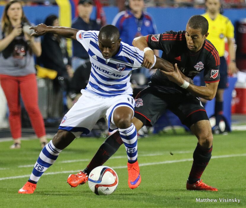 18 April 2015 - FC Dallas midfielder Fabian Castillo (#11) and Toronto FC defender Justin...