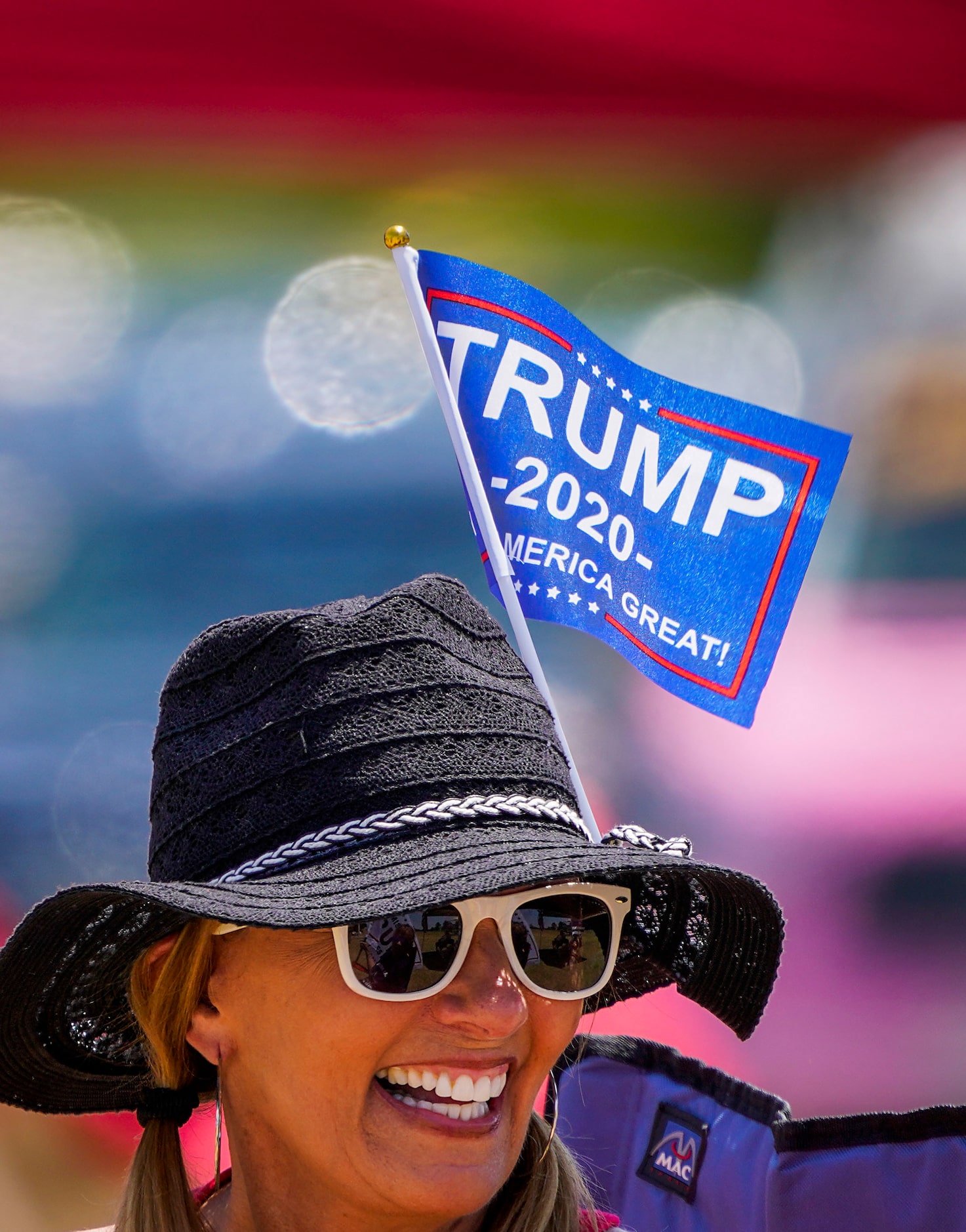 Supporters of President Donald Trump attend a campaign rally and boat parade at Oak Grove...