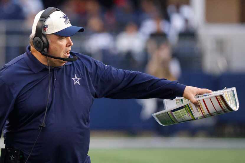 Dallas Cowboys head coach Mike McCarthy reacts during the first half of an NFL football game...