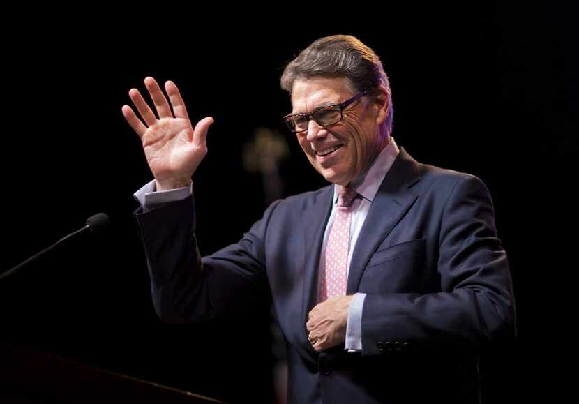 Former Texas Gov. Rick Perry waved to the crowd as he spoke at the RedState Gathering last...