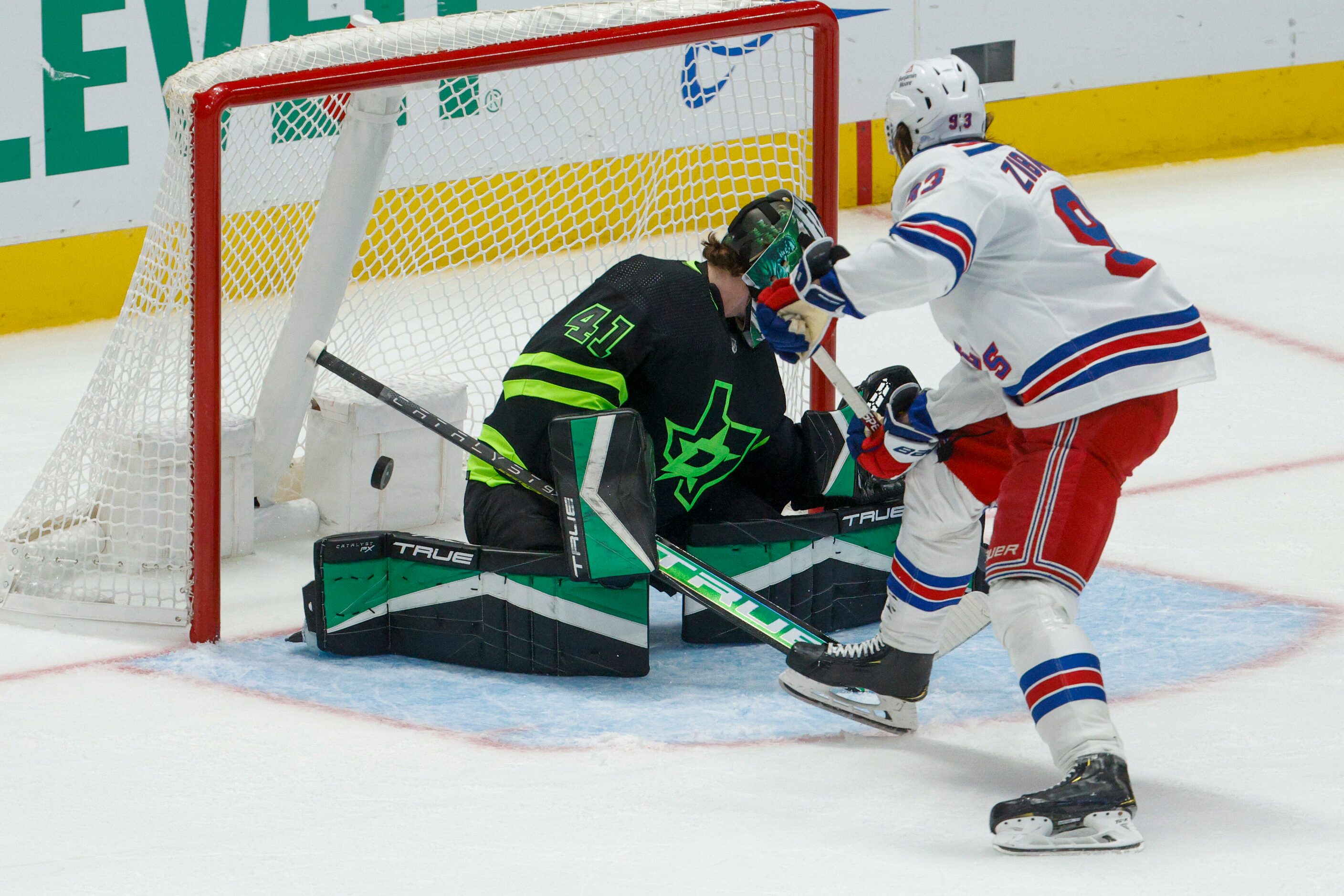 New York Rangers center Mika Zibanejad (93) scores a goal past Dallas Stars goaltender Scott...