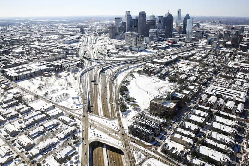 Snow covered downtown Dallas after a record snowfall on Thursday, March 5, 2015. Overnight...
