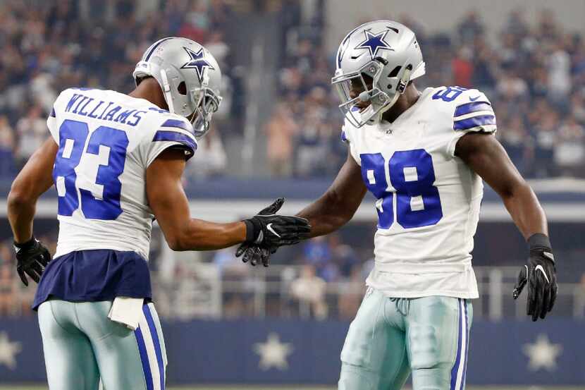 Dallas Cowboys wide receiver Dez Bryant (88) celebrates with Dallas Cowboys wide receiver...