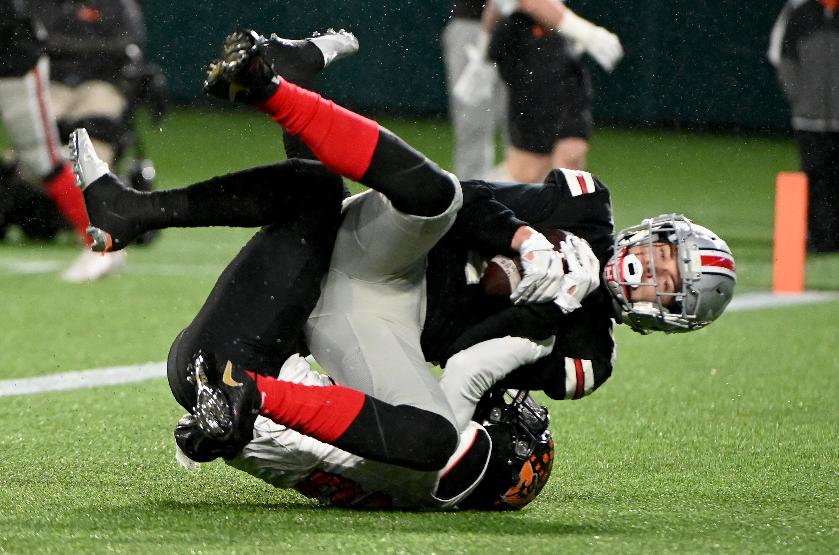 Lovejoy’s Reid Westervelt (7) is tackled in the end zone by Aledo’s Jaden Allen in the first...
