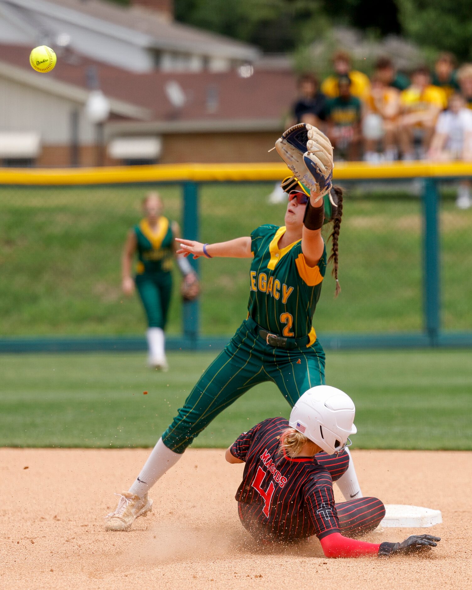 Austin Hyde Park Baptist outfielder Brooke Magids (4) safely steals second base ahead of...