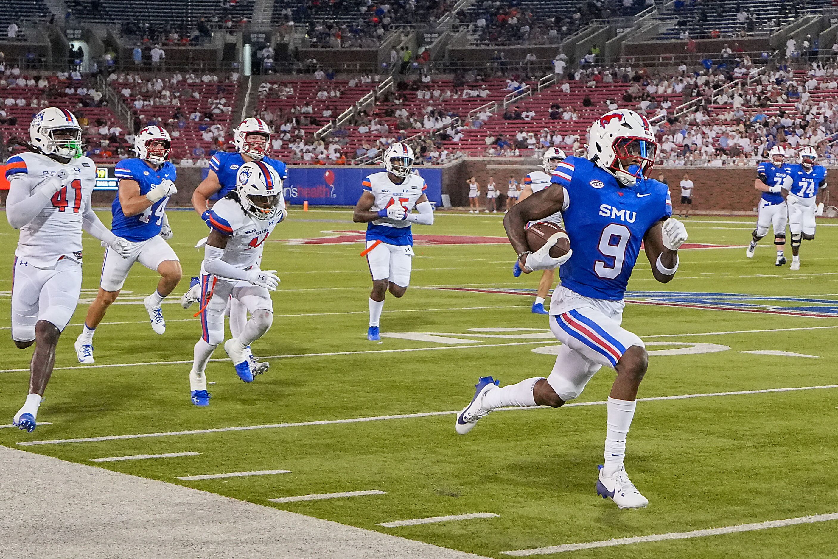 SMU wide receiver Key'Shawn Smith (9) races down the sidelines on a 35-yard touchdown during...