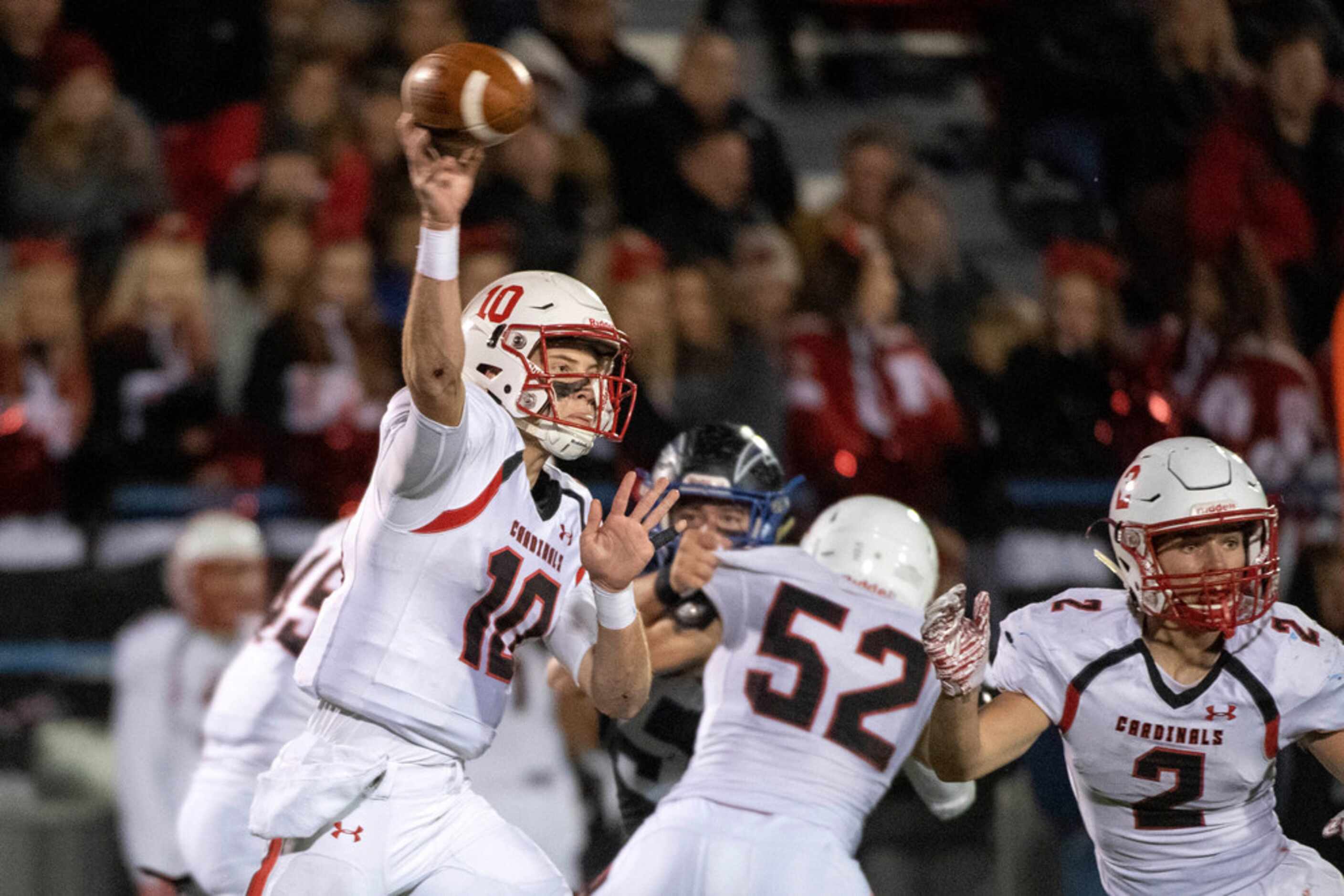 Fort Worth Christian junior quarterback Carson Cross (10) throws a pass against Dallas...