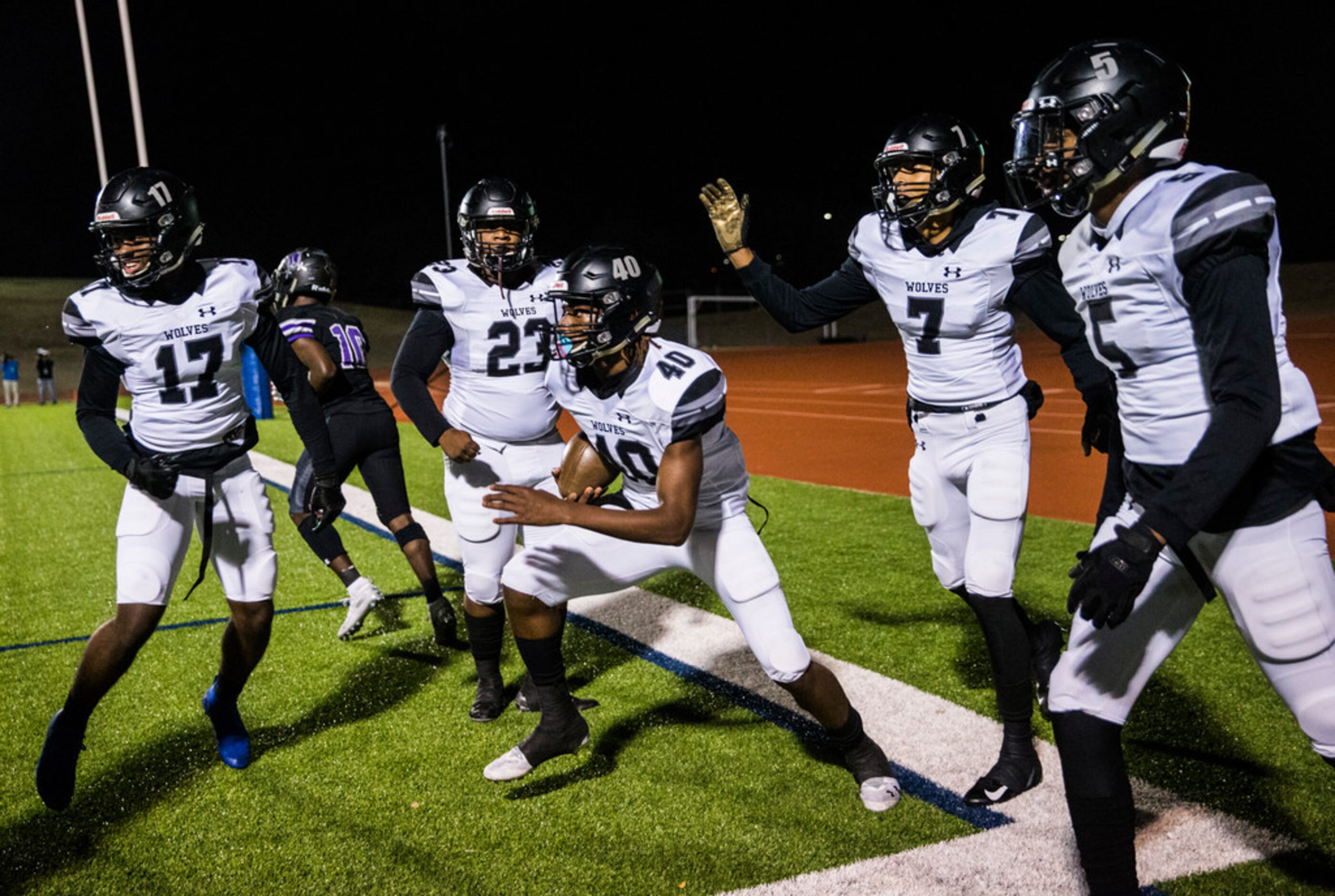 Mansfield Timberview linebacker Alec Ndiaye (40) celebrates after intercepting a pass...