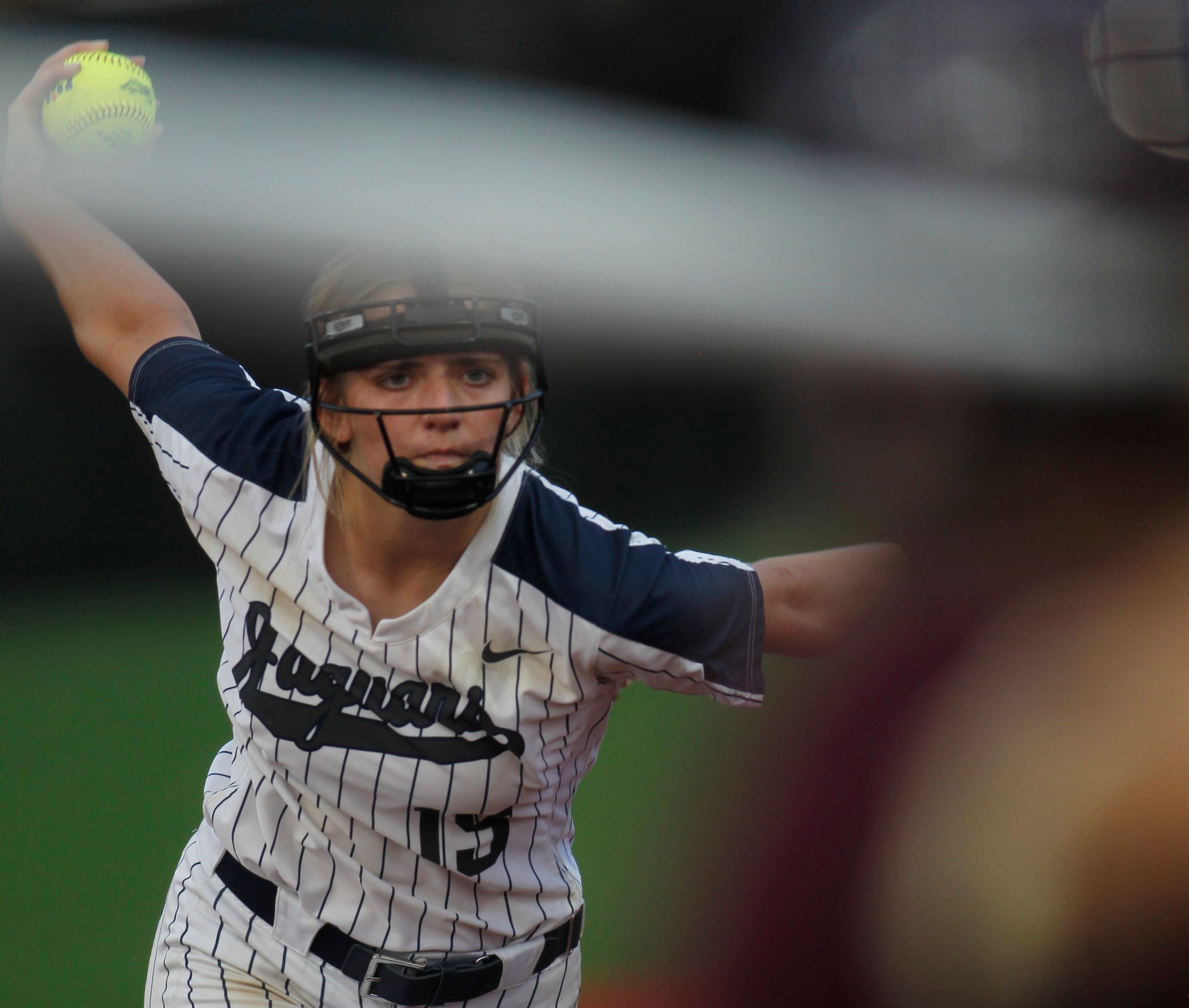 Flower Mound pitcher Landrie Harris (15) delivers a pitch to a Deer Park batter during the...