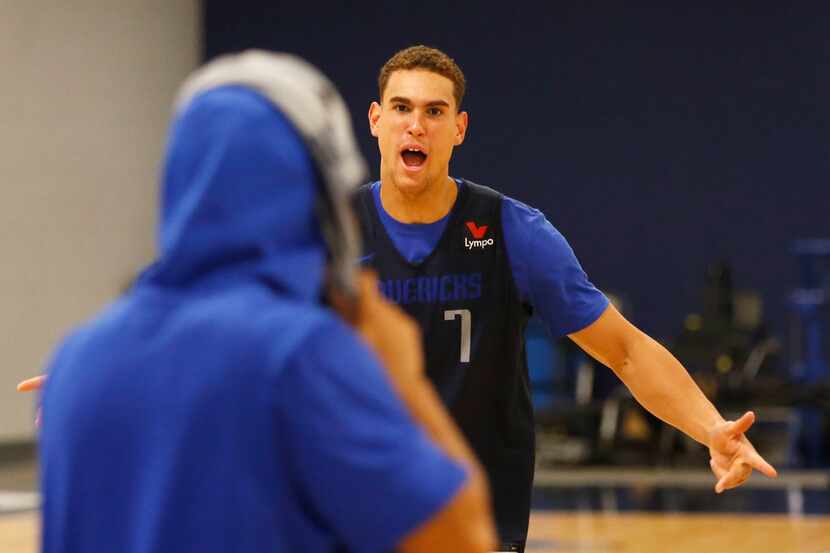 Dallas Mavericks forward Dwight Powell (7) celebrates after beating Dallas Mavericks guard...