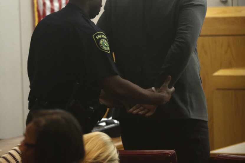 Former Dallas Cowboys player Josh Brent is put in handcuffs after the verdict.