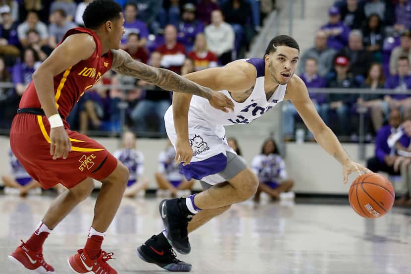 TCU Horned Frogs guard Kenrich Williams (34) drive the ball around Iowa State Cyclones guard...