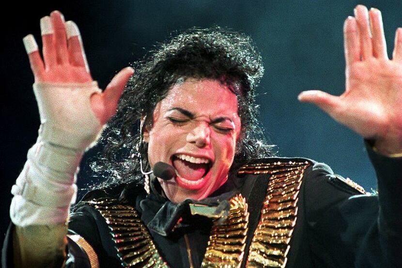 In this file photo taken on Aug. 31, 1993, Michael Jackson performs during his "Dangerous"...