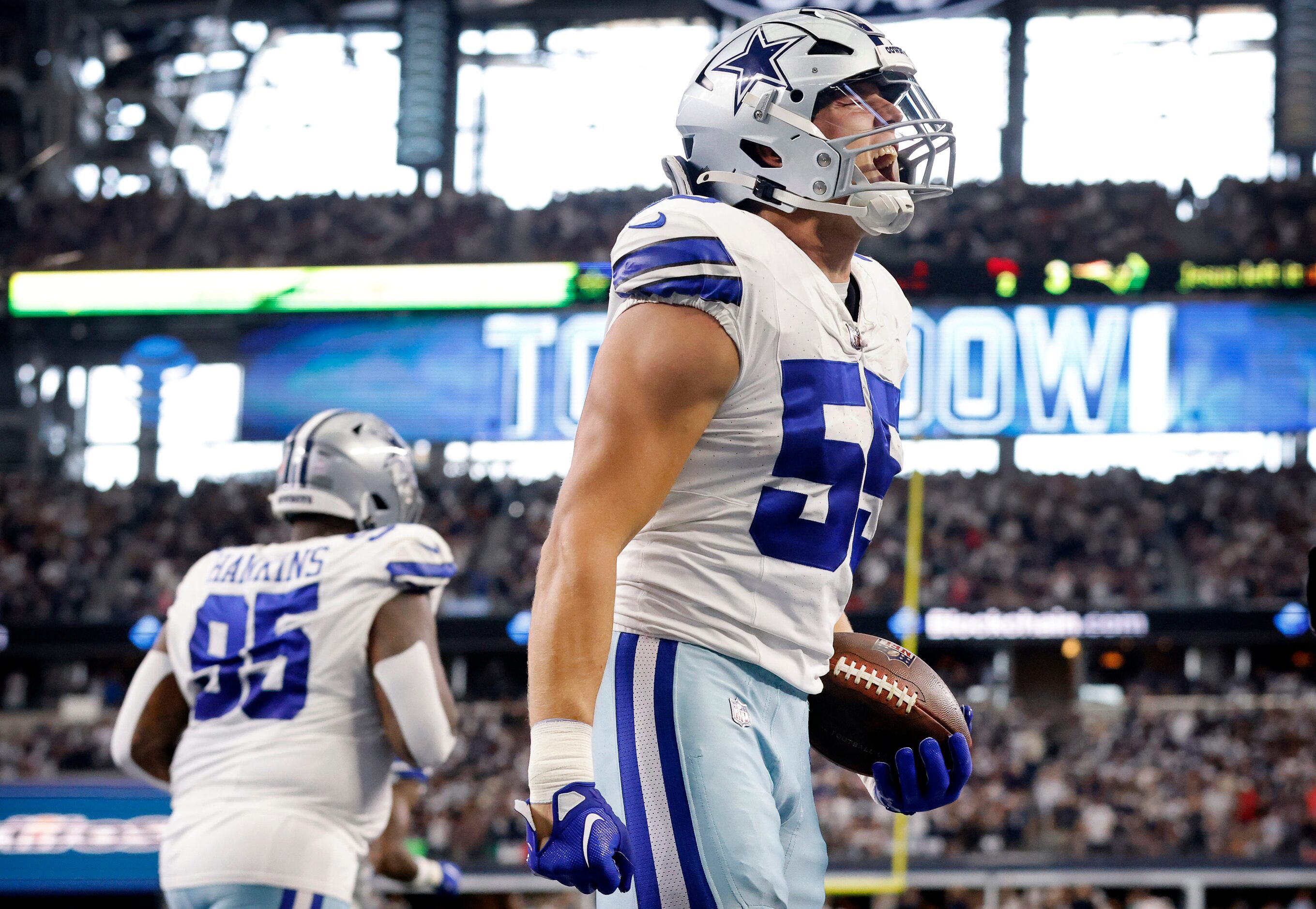 Dallas Cowboys linebacker Leighton Vander Esch (55) celebrates his scoop and score after New...