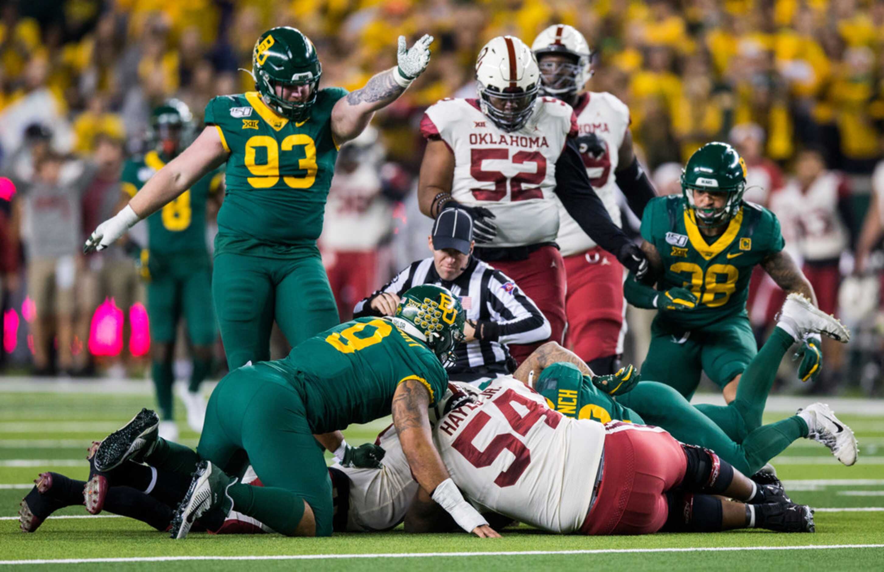 Baylor Bears recovers a fumble for a turnover during the first quarter of an NCAA football...