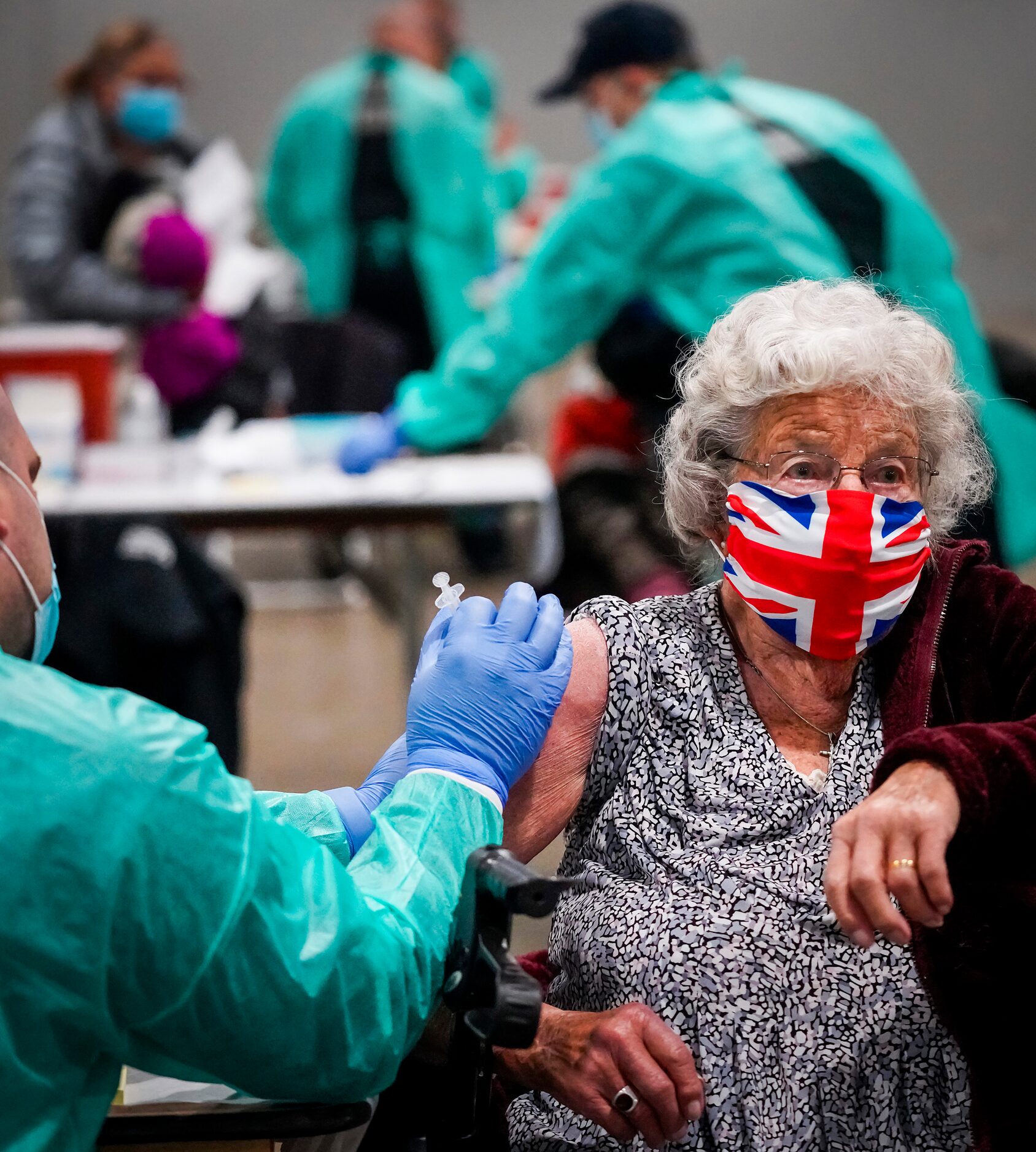 Georgette McGarrad, 99, receives the COVID-19 vaccine at Fair Park on Monday, Jan. 11, 2021,...