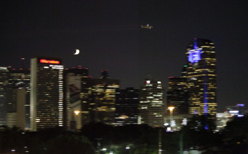 A plane carrying out aerial spraying to kill mosquitos and control the spread of  West Nile...